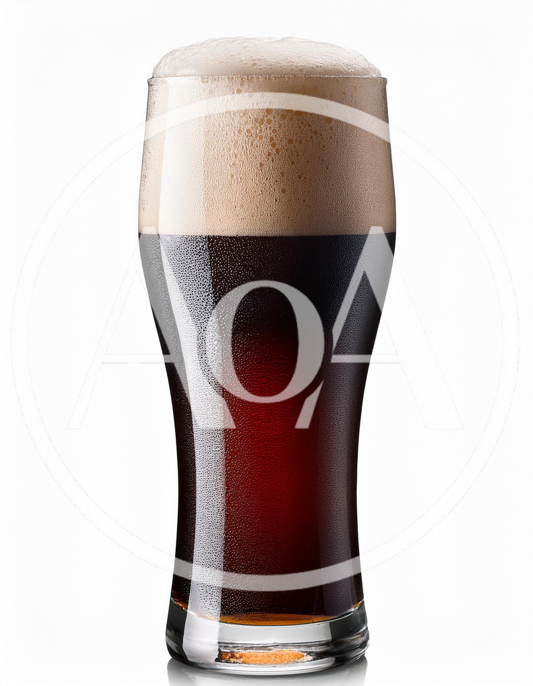Glass Of Dark Stout Beer With Thick Foam
