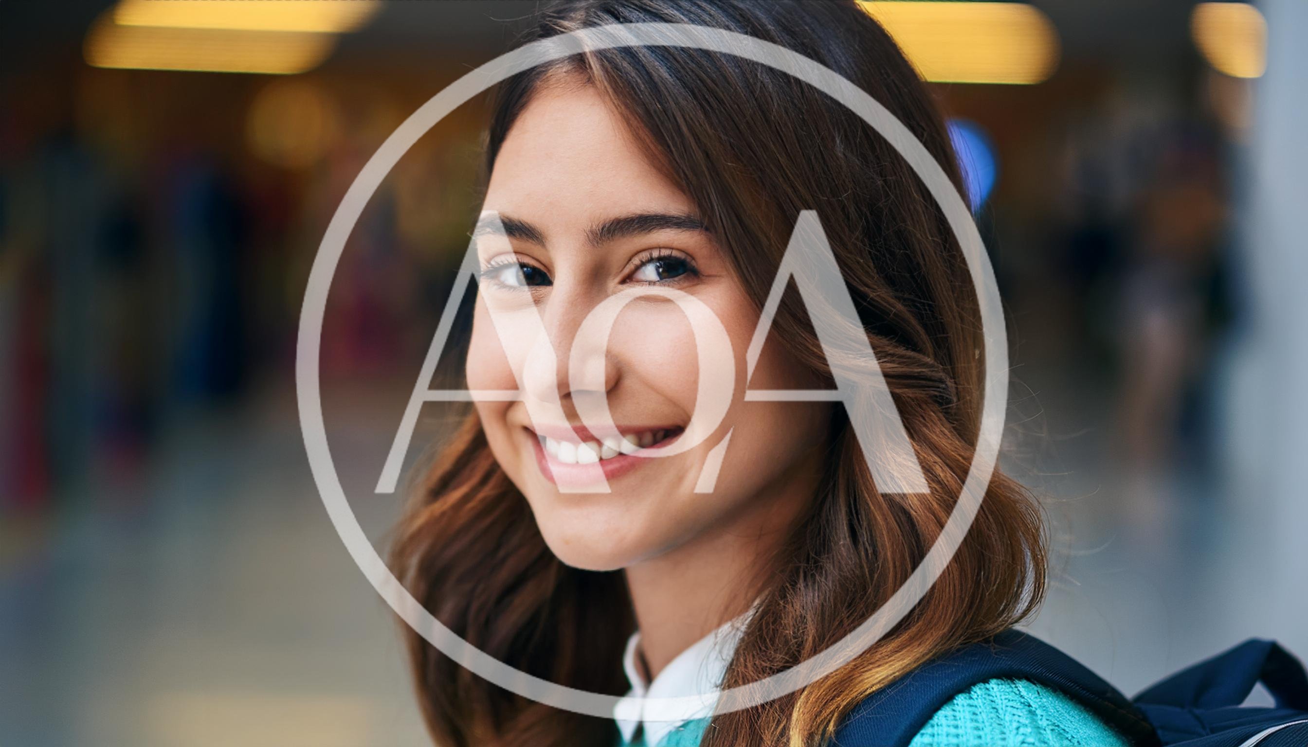 Portrait Of A Smiling Young Female Student