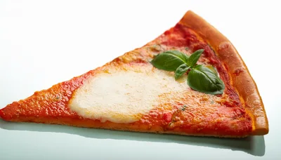 Single Slice Of Margherita Pizza With Fresh Basil