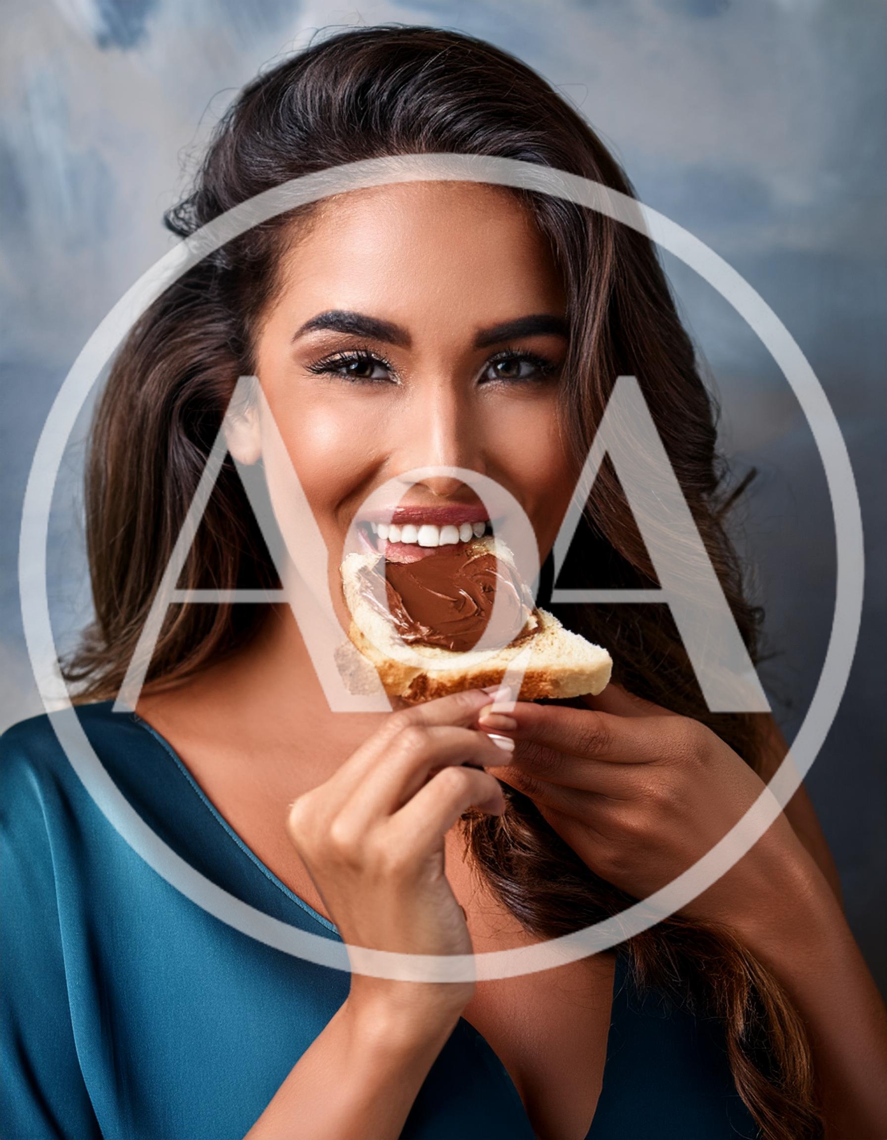 Beautiful Woman Eating A Slice Of Chocolate Spread Toast