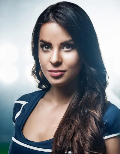 Portrait Of A Beautiful Young Woman In Sports Attire