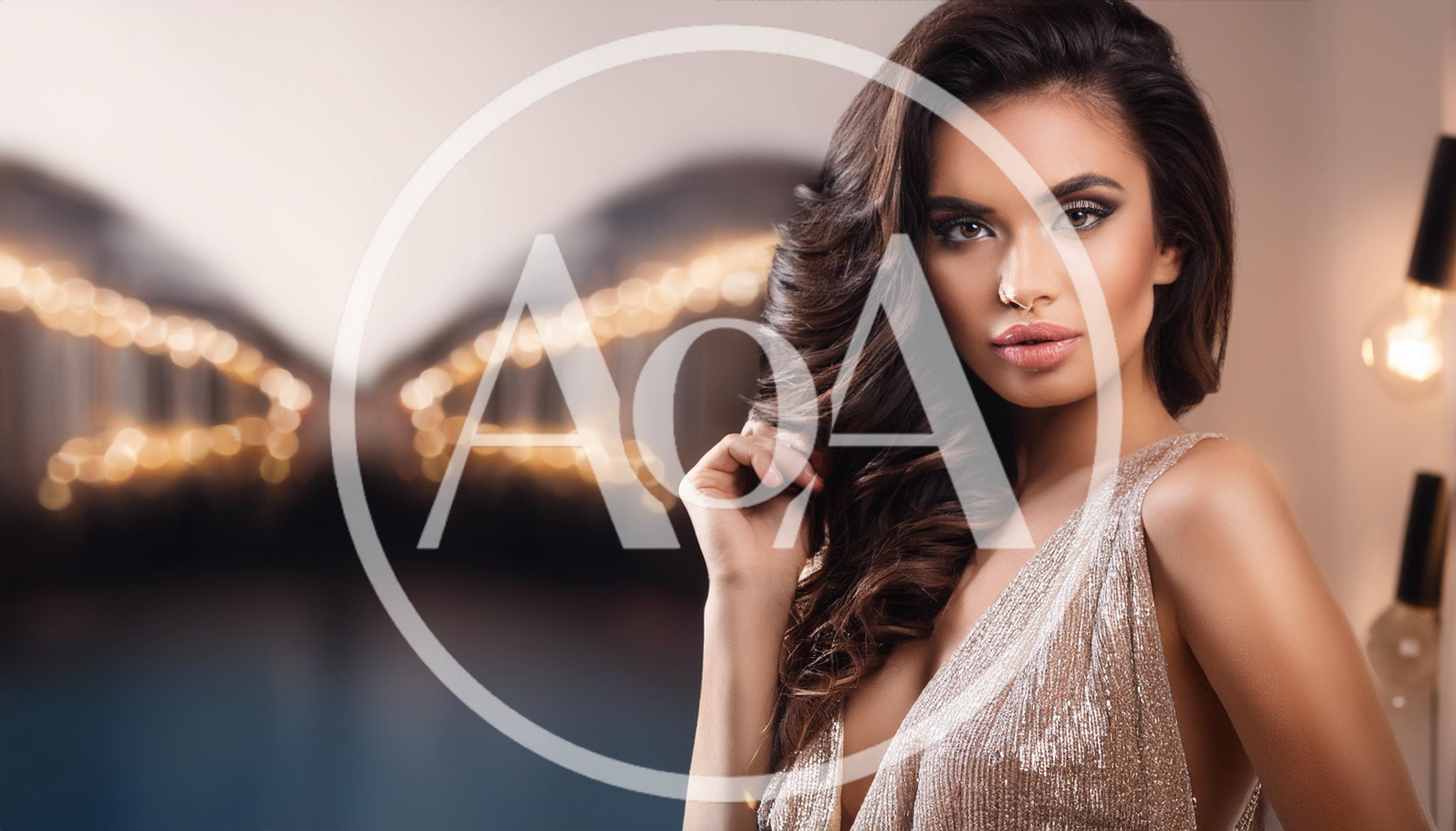 Glamorous Woman With Wavy Hair In Evening Dress