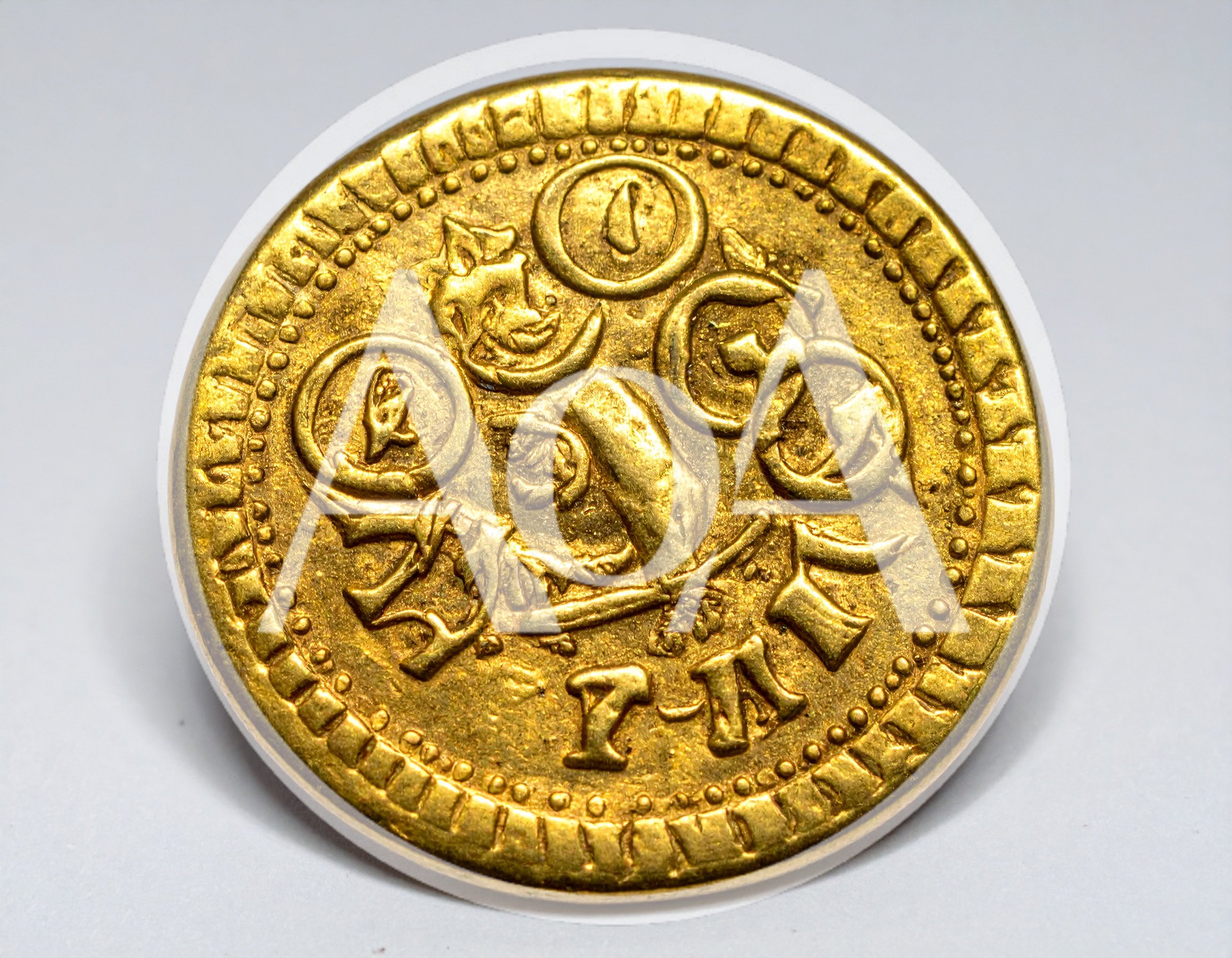 Ancient Gold Coin With Intricate Embossed Heraldic Design