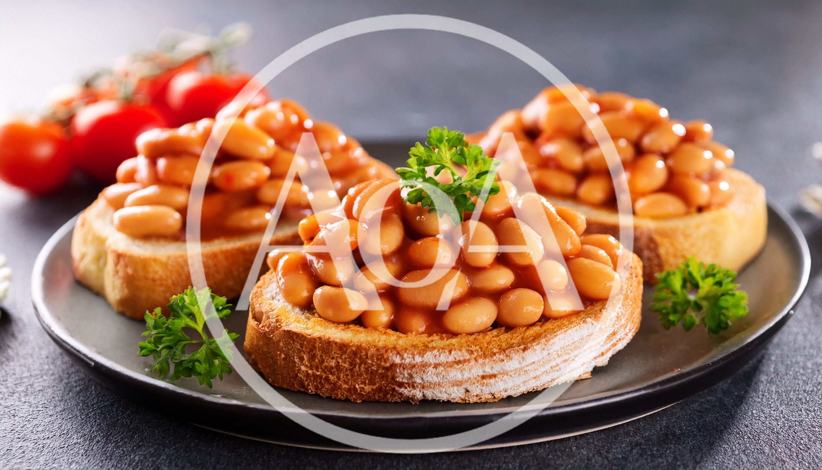 Three Slices Of Toast Topped With Baked Beans