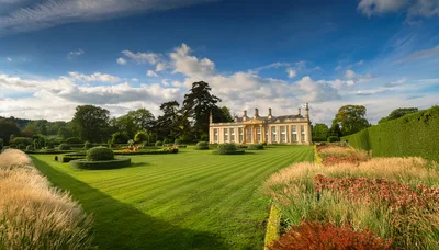 Stately Country House With Manicured Gardens