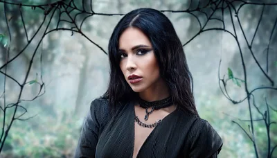 Gothic Woman With Dark Makeup In Misty Forest
