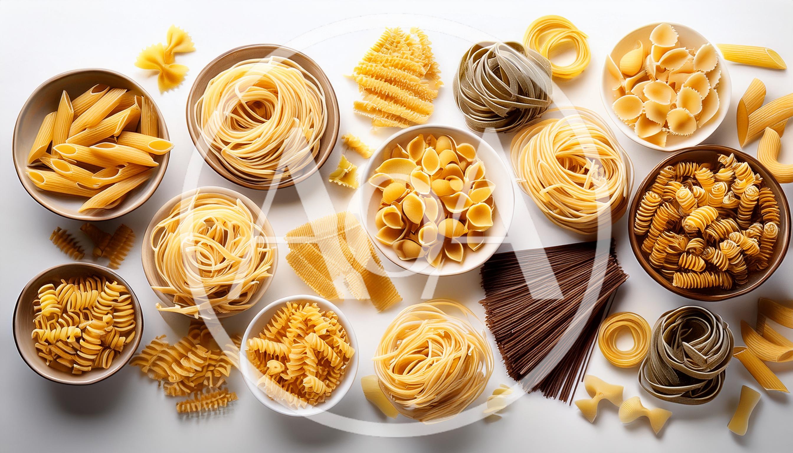 Assorted Varieties Of Raw Pasta In Bowls
