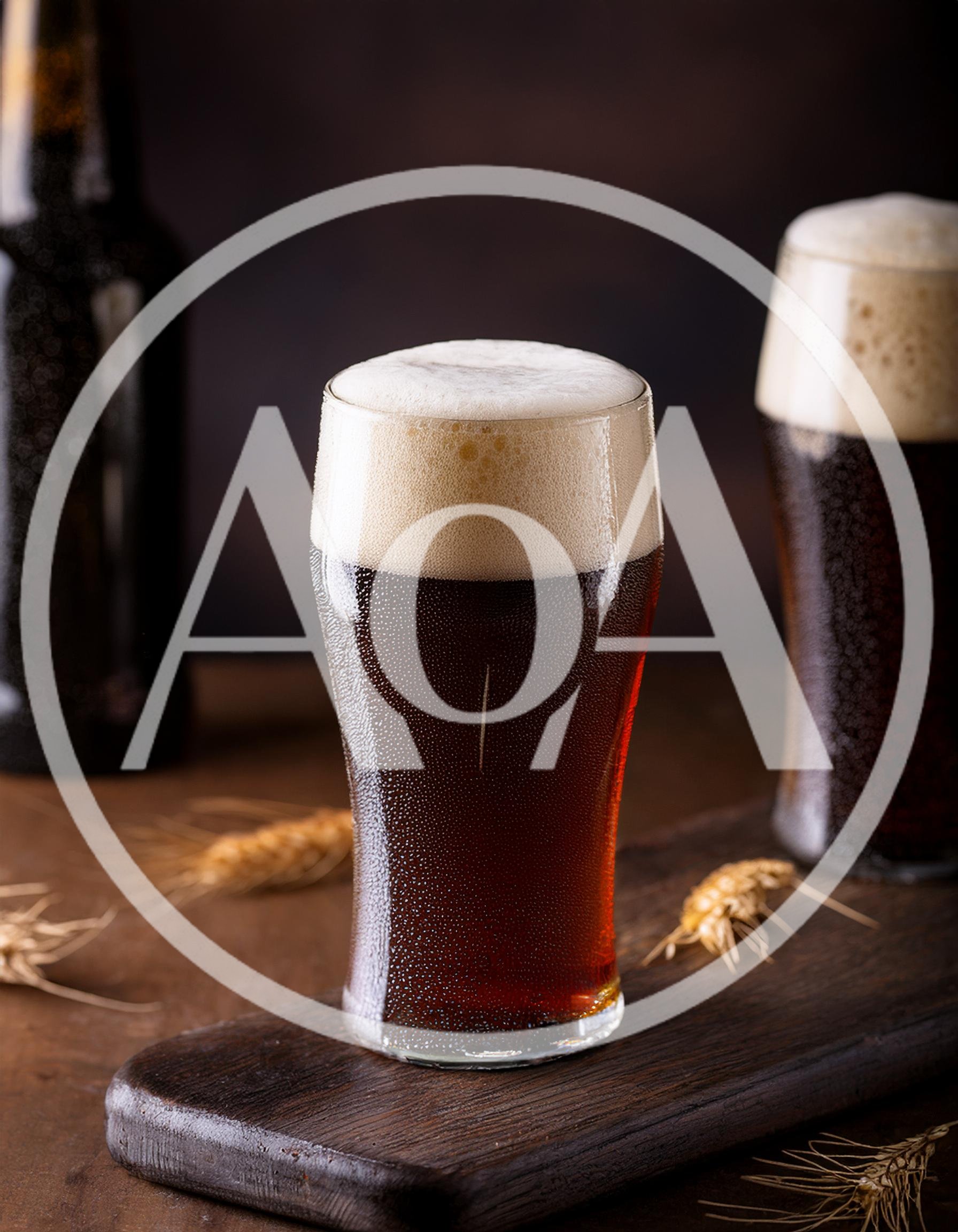 Two Glasses Of Dark Beer On A Wooden Board