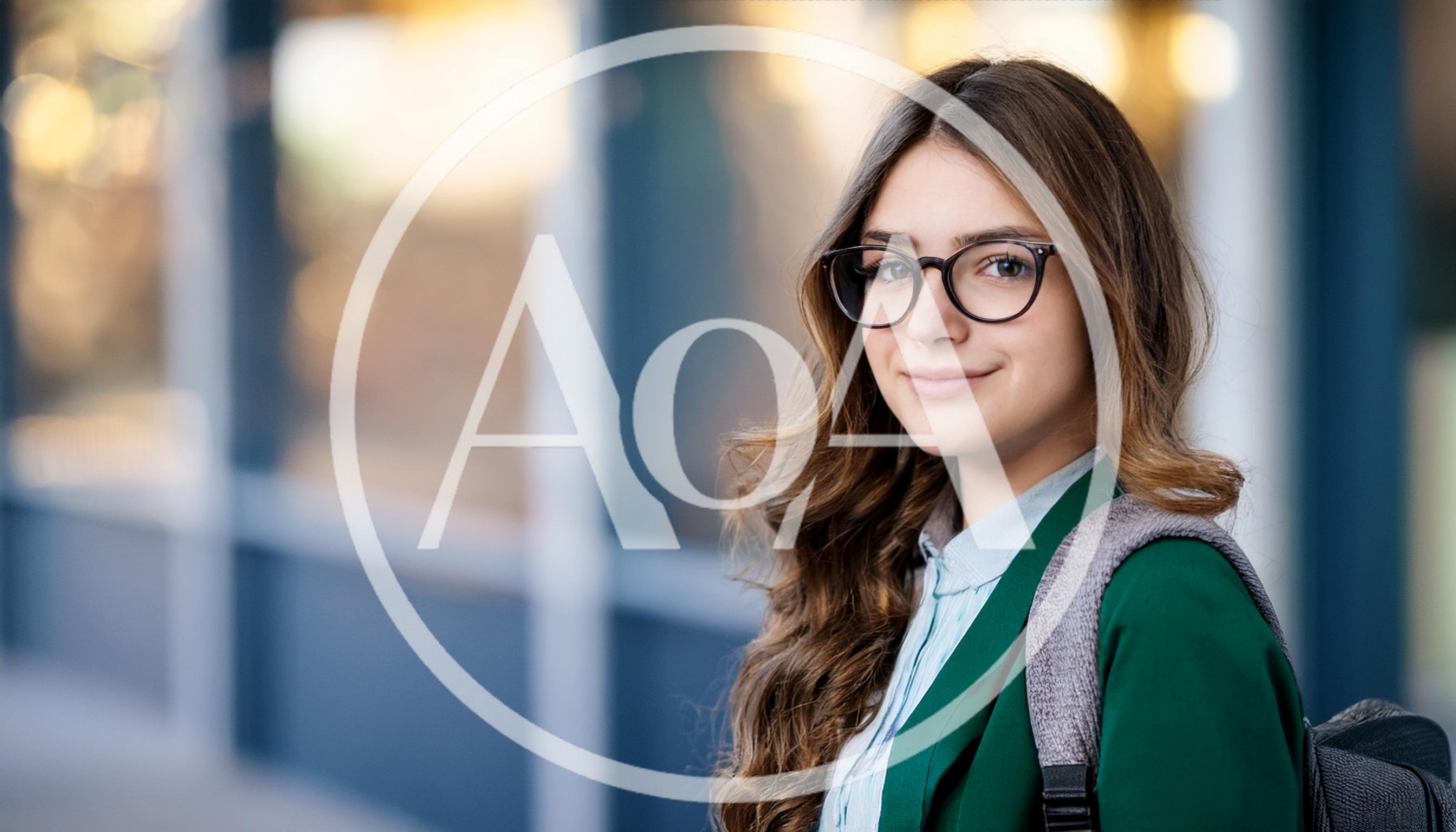 Portrait Of A Young Female Student With Glasses