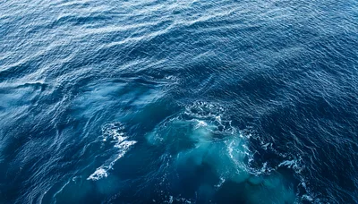 Aerial View Of Deep Blue Ocean Waves