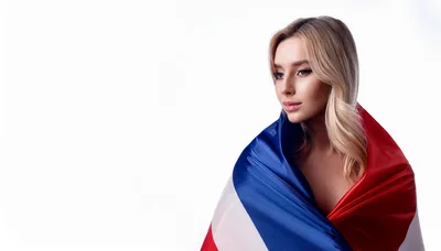 Blonde Woman Wrapped In A French Flag