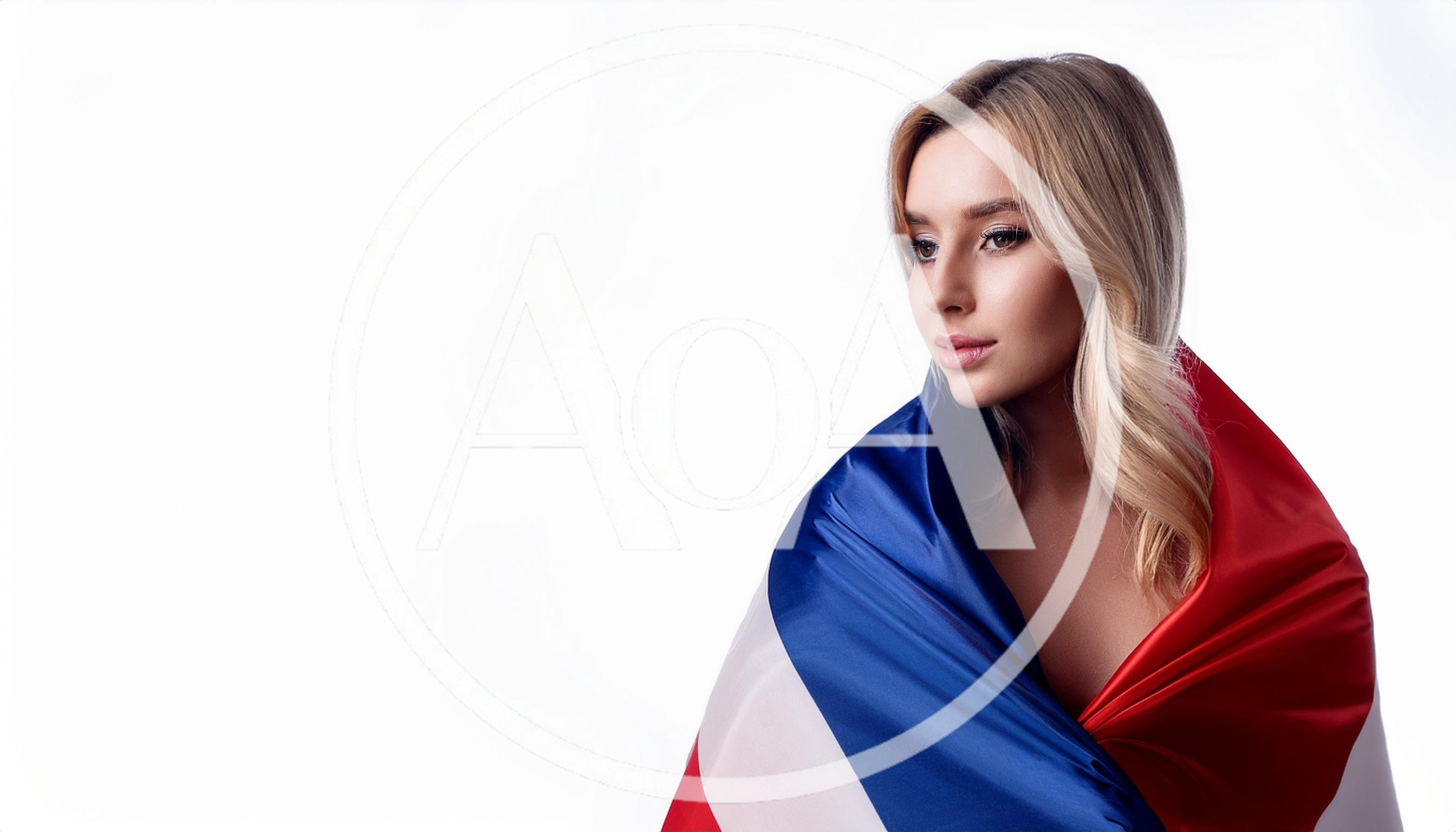 Blonde Woman Wrapped In A French Flag