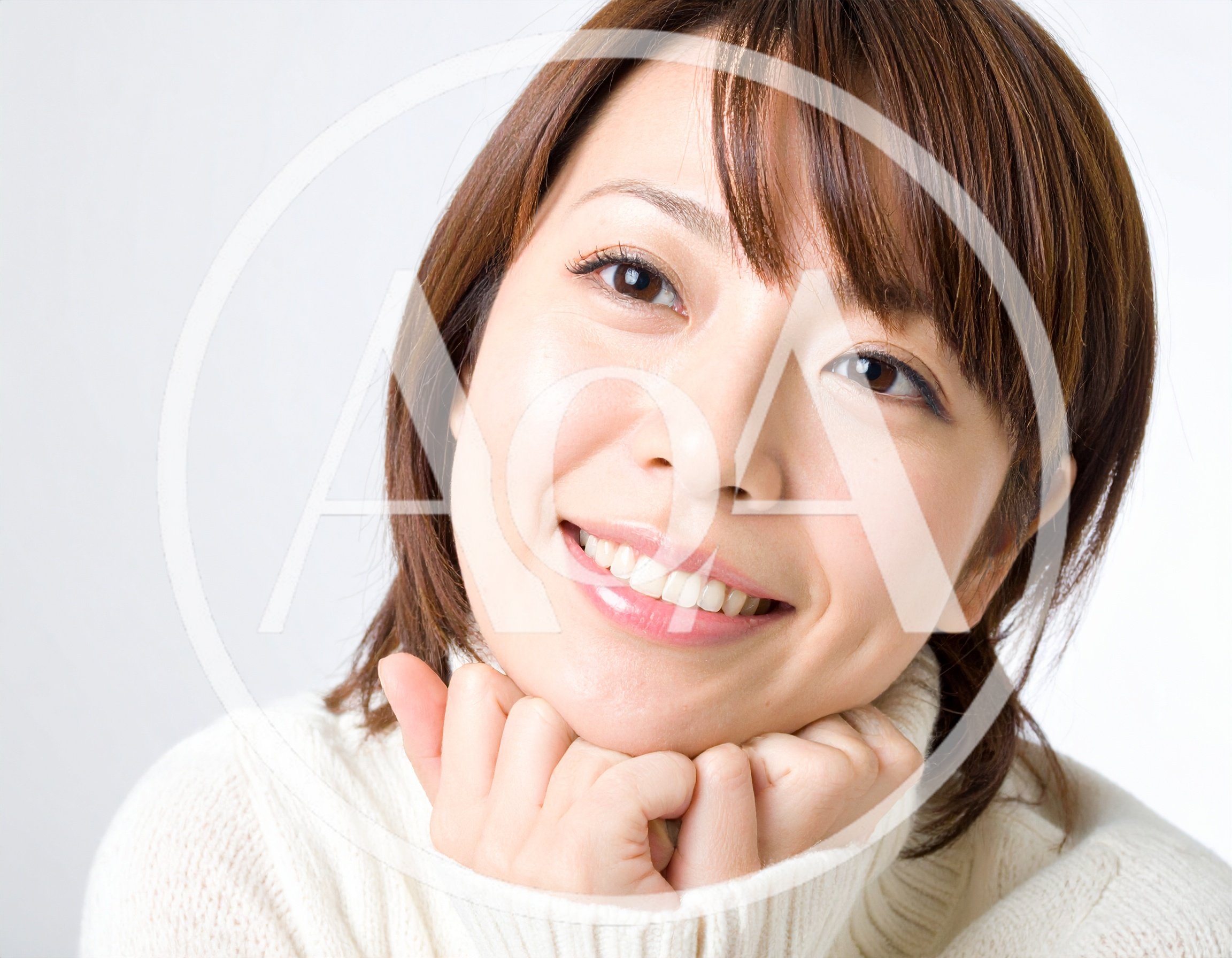 Portrait Of A Smiling Young Japanese Woman