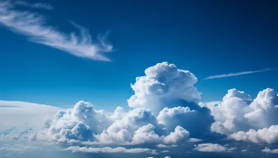 Majestic Cumulus Clouds In A Deep Blue Sky