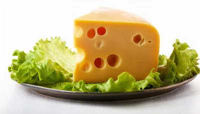 Wedge Of Swiss Cheese On A Bed Of Lettuce