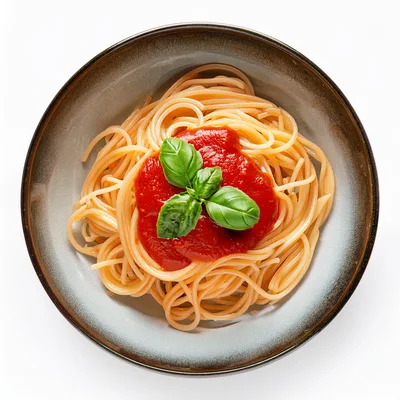 Spaghetti With Tomato Sauce And Fresh Basil Leaves