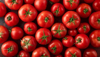 Fresh Red Tomatoes Arranged On Dark Background
