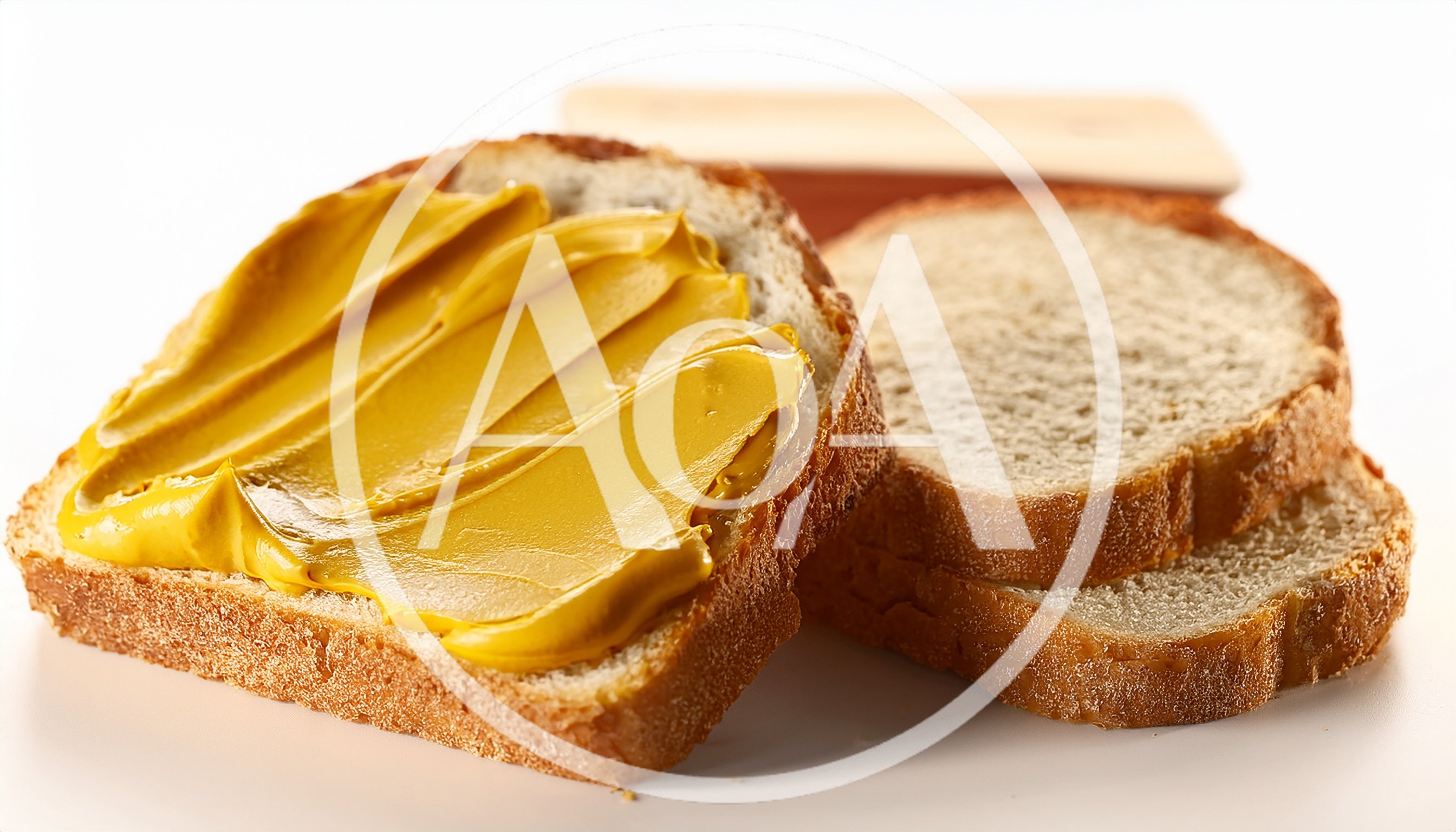 Peanut Butter Spread on a Slice of Bread