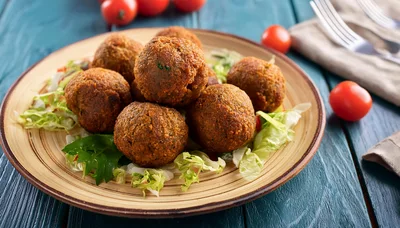 Plate Of Crispy Falafel Balls On Lettuce