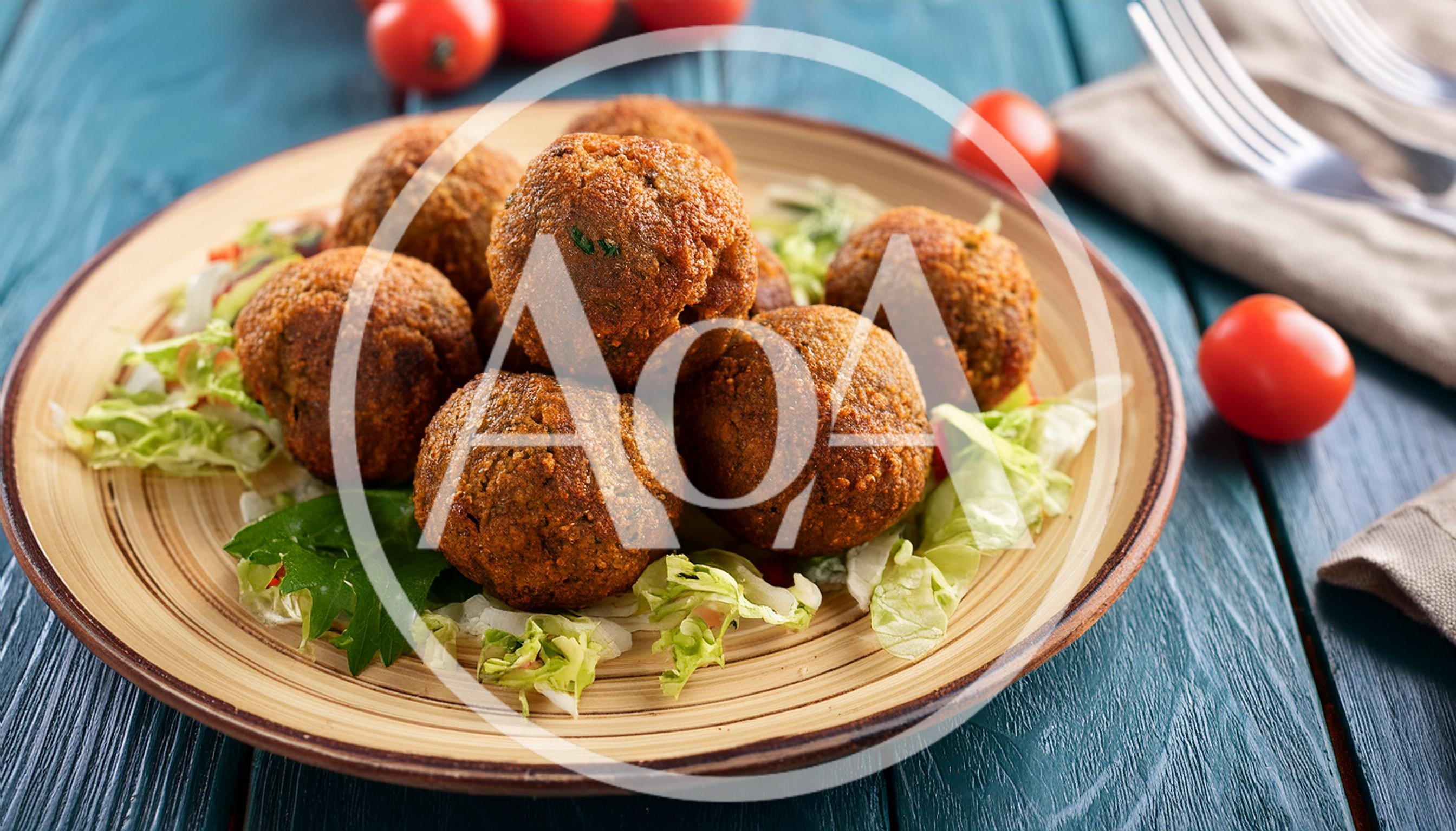 Plate Of Crispy Falafel Balls On Lettuce
