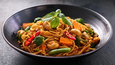 Stir Fried Noodles With Vegetables And Cashews