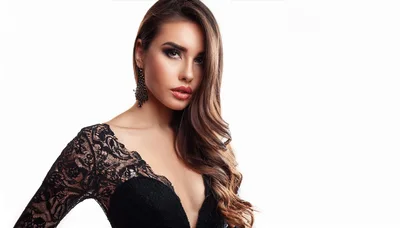 Elegant Woman With Long Wavy Hair In Lace Dress