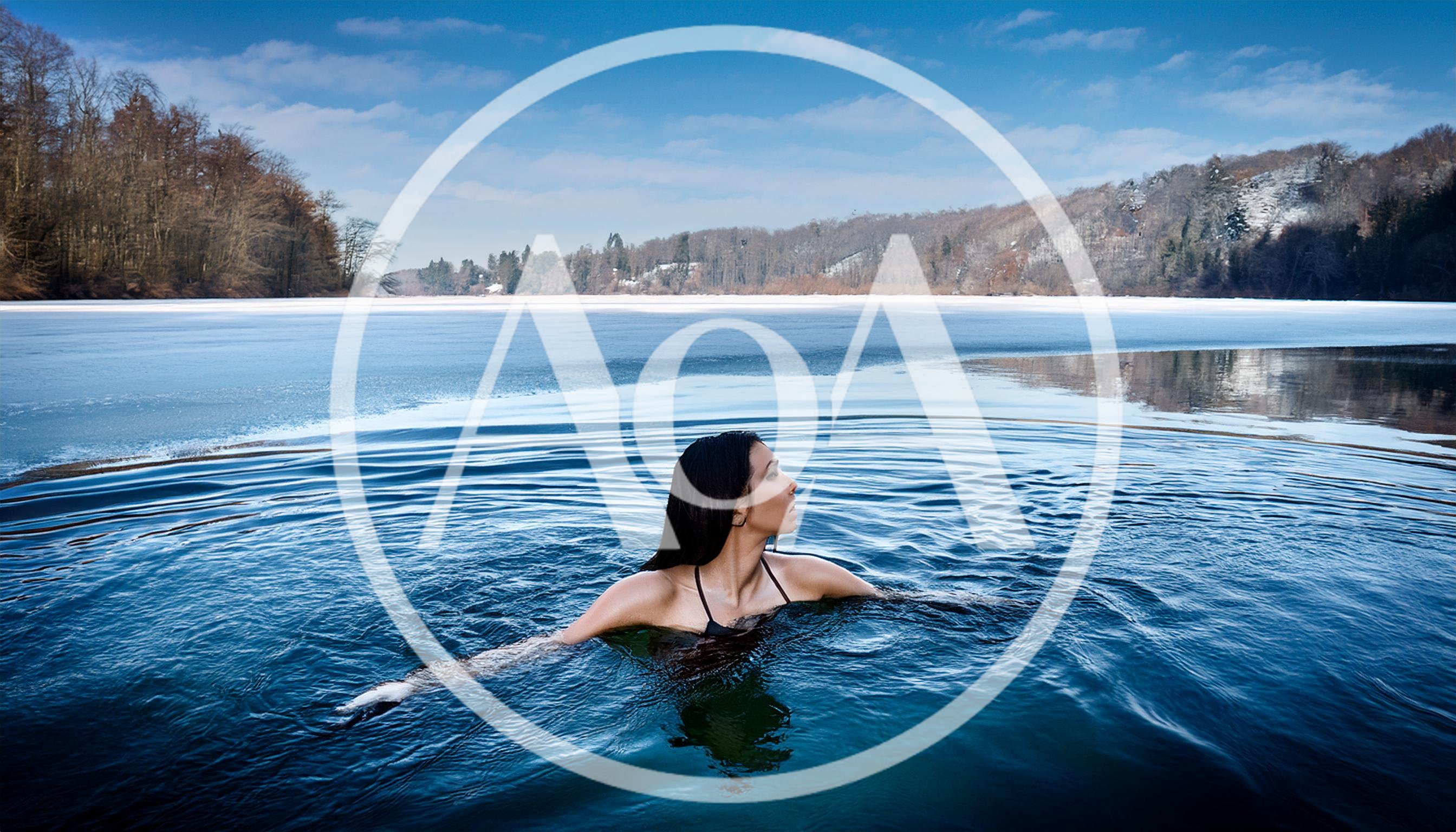 Woman Swimming In A Frozen Lake