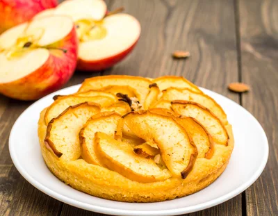 Freshly Baked Apple Tart on a Wooden Table