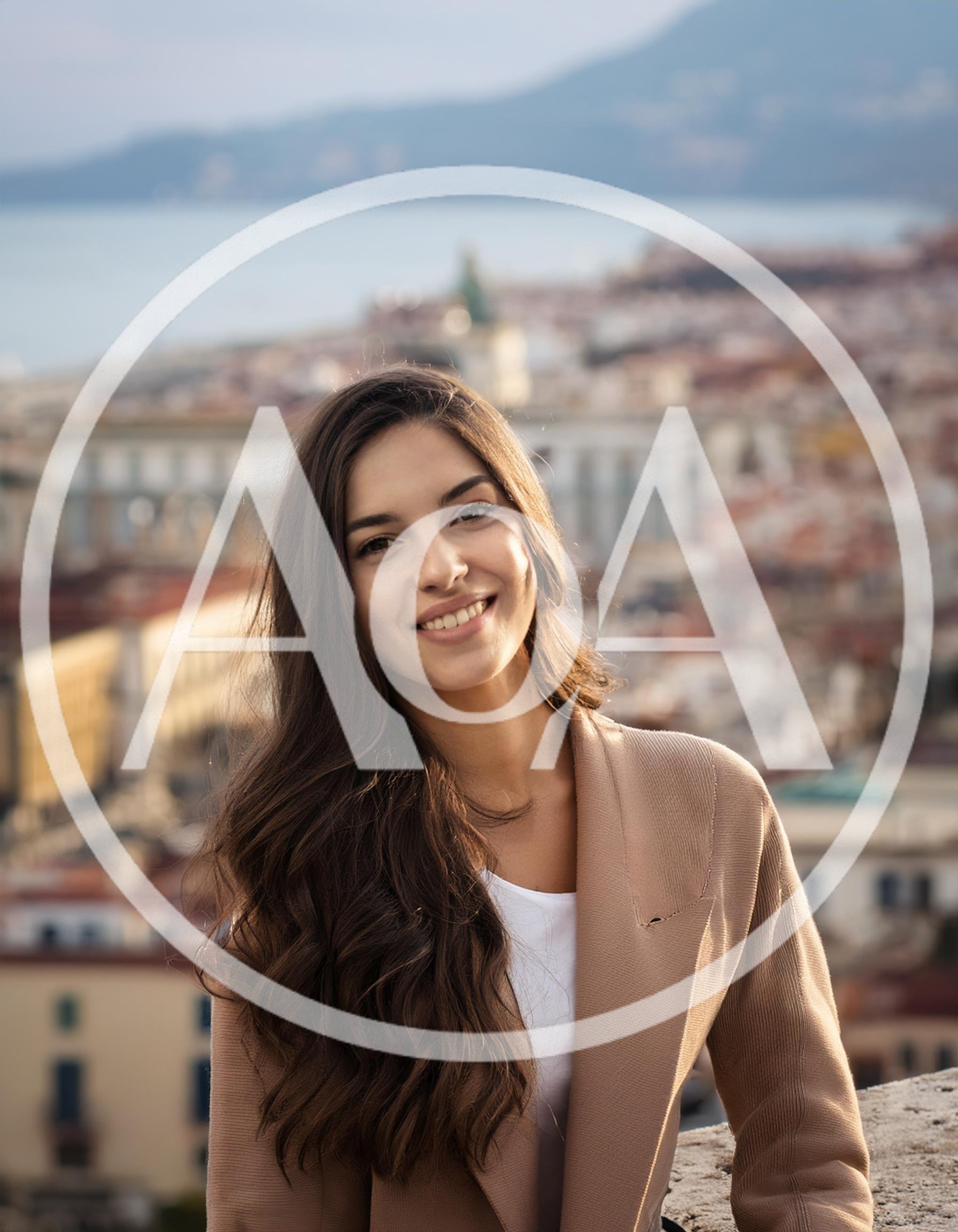 Portrait Of A Smiling Young Woman Outdoors