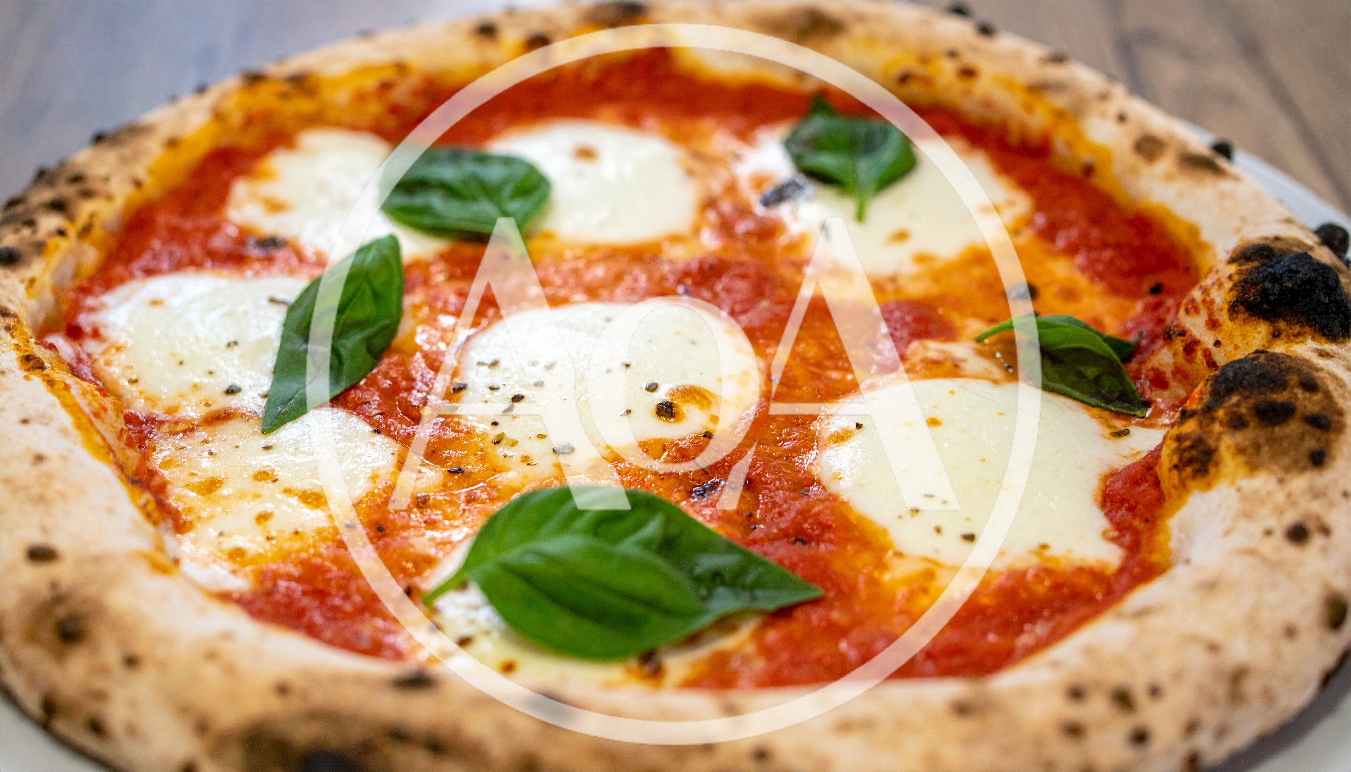 Freshly Baked Neapolitan Margherita Pizza With Basil
