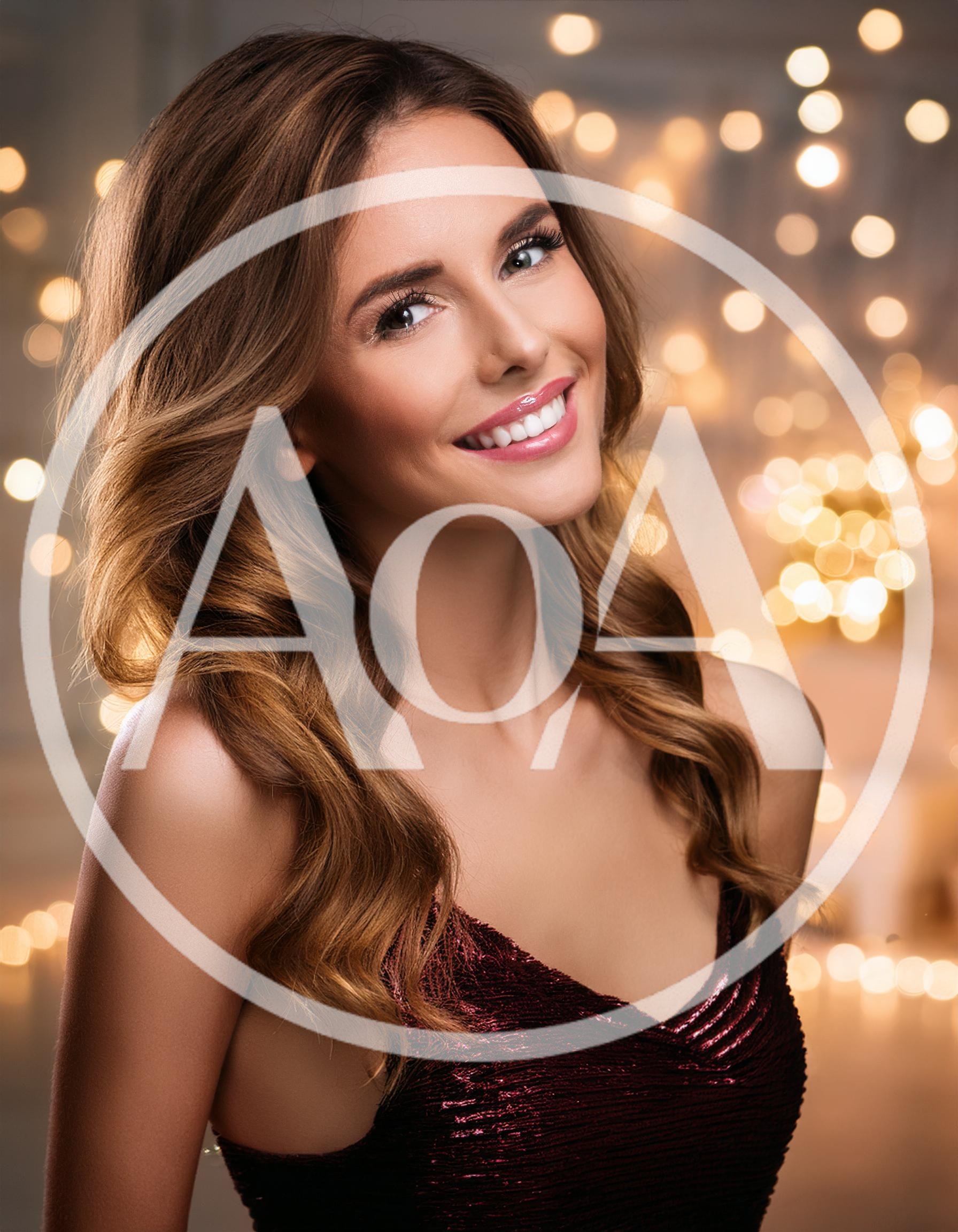 Portrait Of A Smiling Woman In A Festive Dress