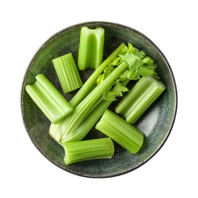 Fresh Celery Stalks Arranged On A Dark Plate