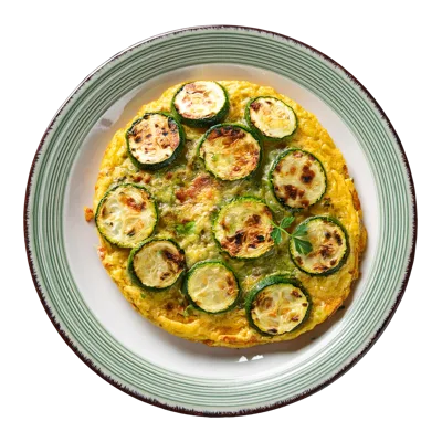 Zucchini Frittata Served On A Striped Plate