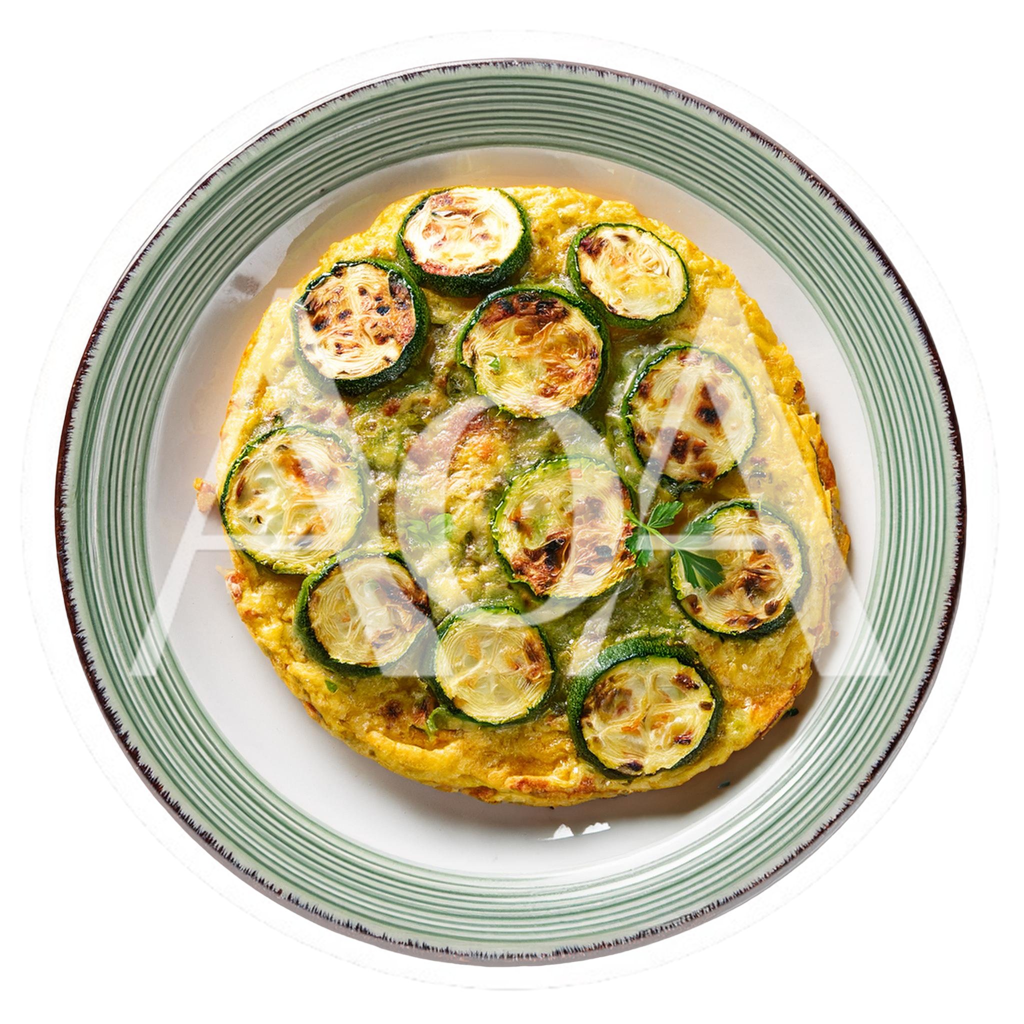 Zucchini Frittata Served On A Striped Plate