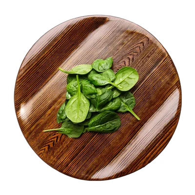 Fresh Spinach Leaves On A Wooden Plate