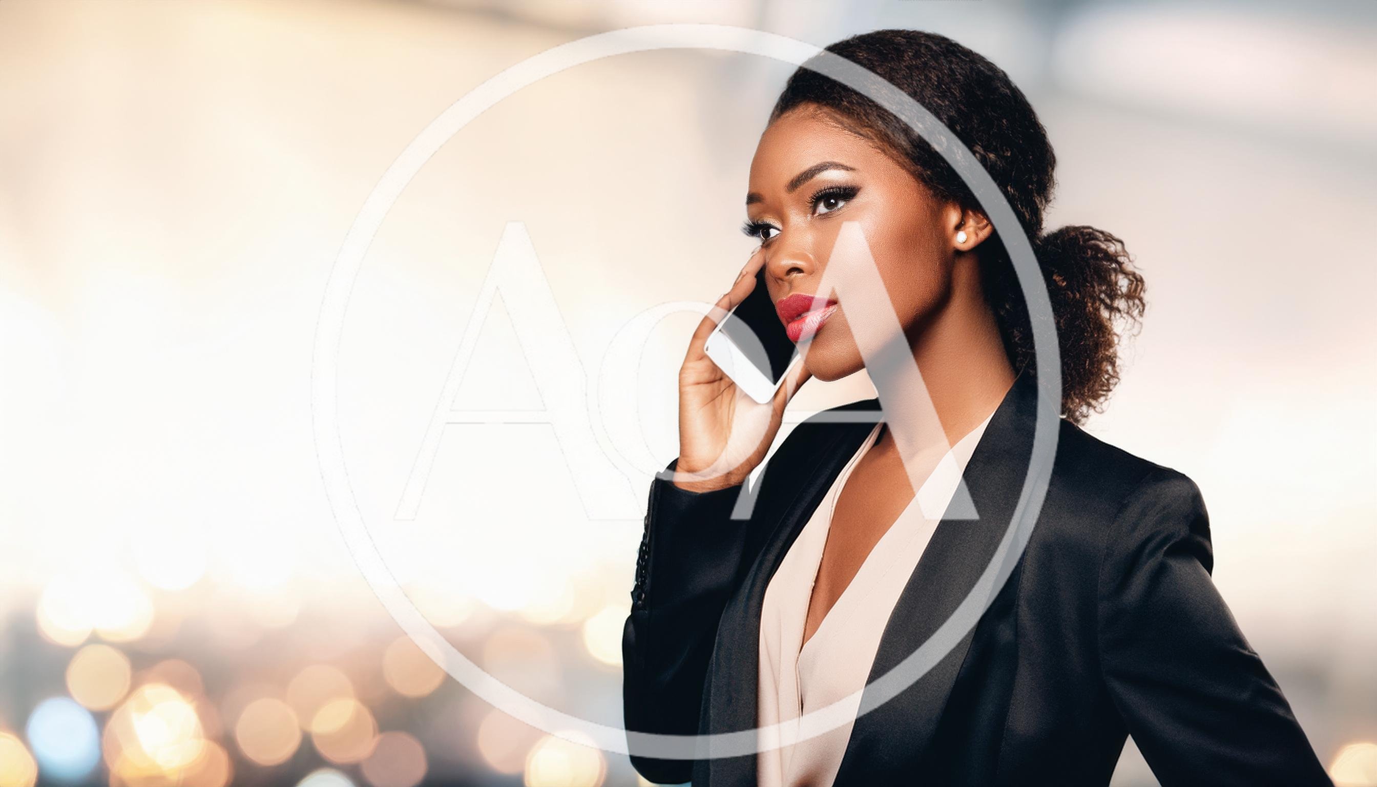 Professional Businesswoman Talking On Smartphone In Office