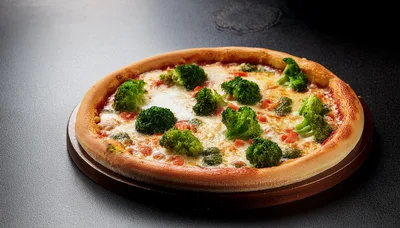 Fresh Broccoli Pizza on a Wooden Serving Board