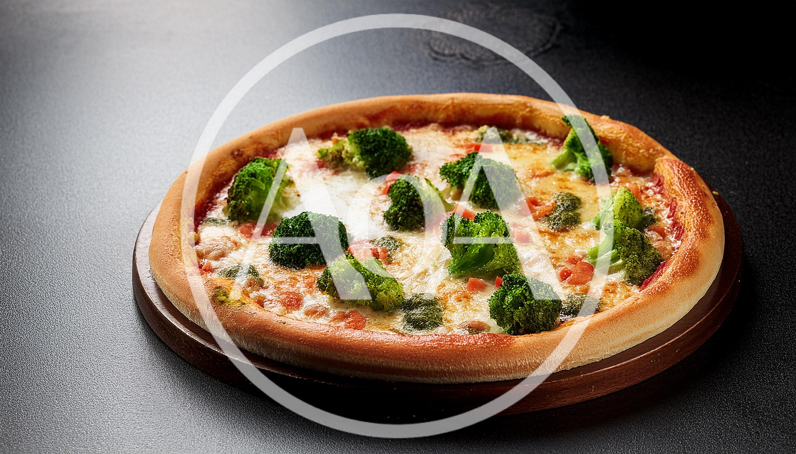Fresh Broccoli Pizza on a Wooden Serving Board