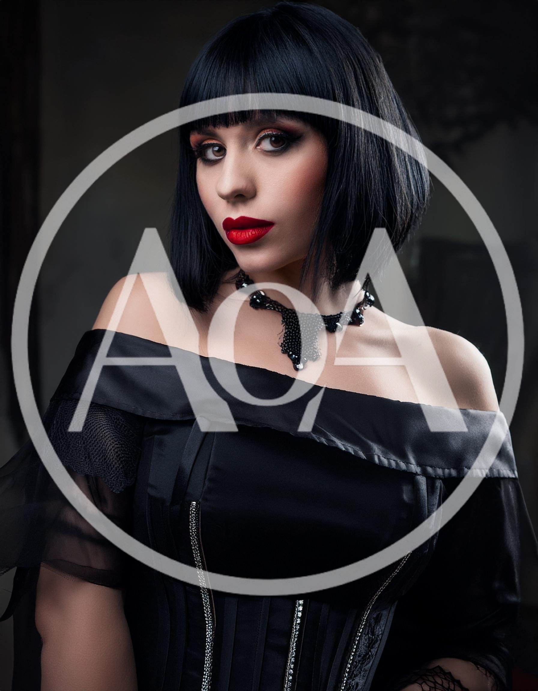 Gothic Woman With Bob Haircut And Red Lipstick