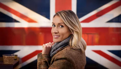 Young Woman Posing In Front Of British Flag