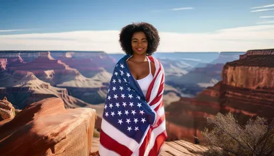 Young Woman Wrapped In American Flag At Grand Canyon