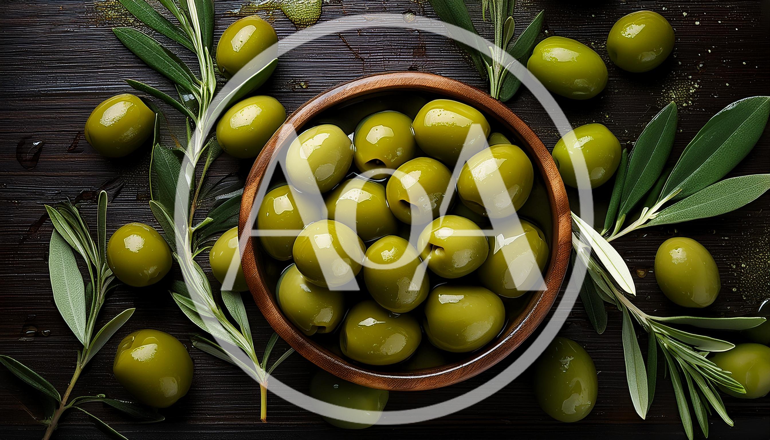 Fresh Green Olives In A Wooden Bowl