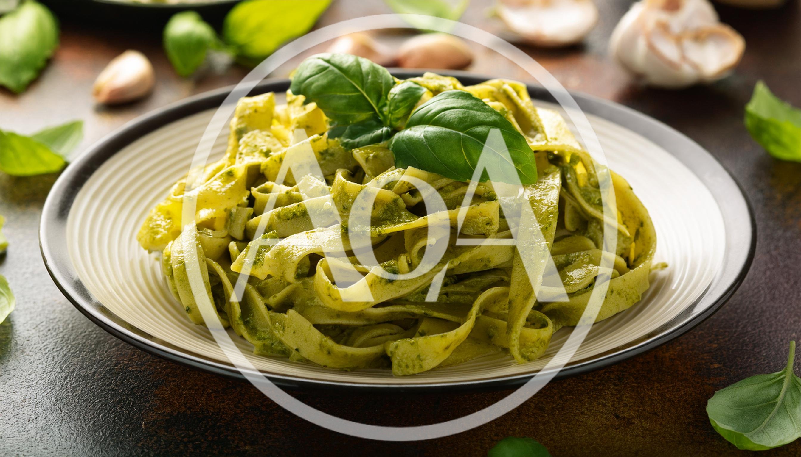 Plate Of Fresh Fettuccine Pasta With Pesto Sauce