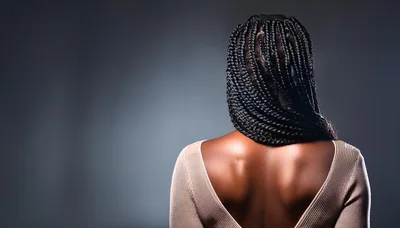 Back View Of A Woman With Braided Hair
