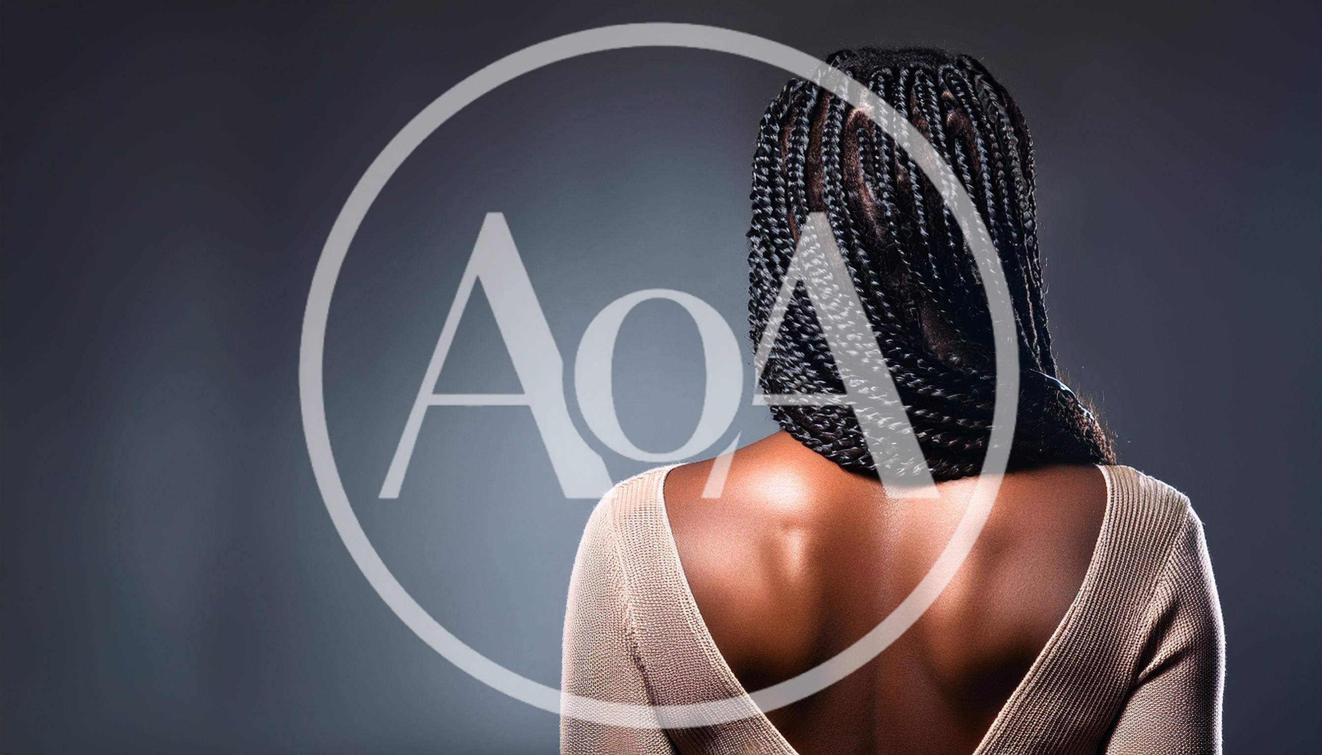 Back View Of A Woman With Braided Hair