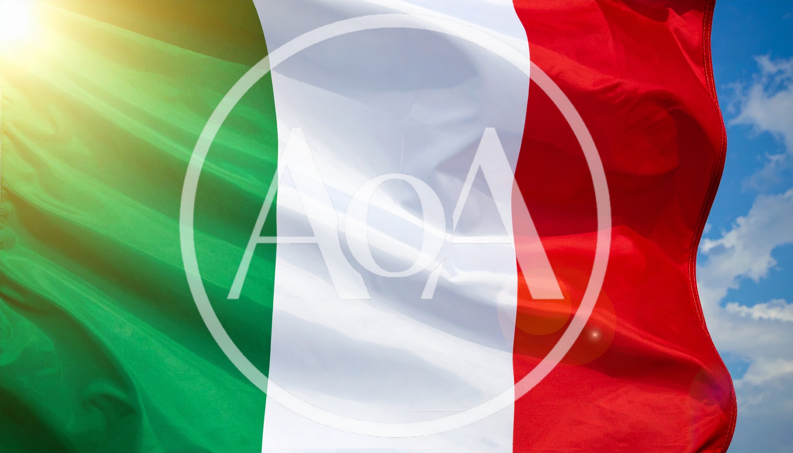 Italian Flag Waving Against A Bright Blue Sky