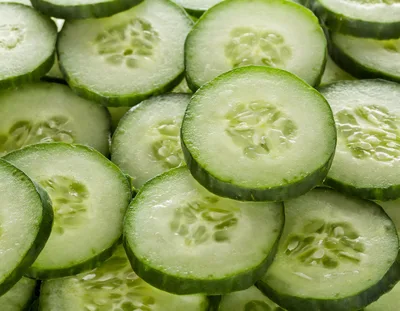 Fresh Sliced Cucumber Rounds Background