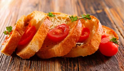 Toasted Bread Slices With Fresh Tomato And Parsley