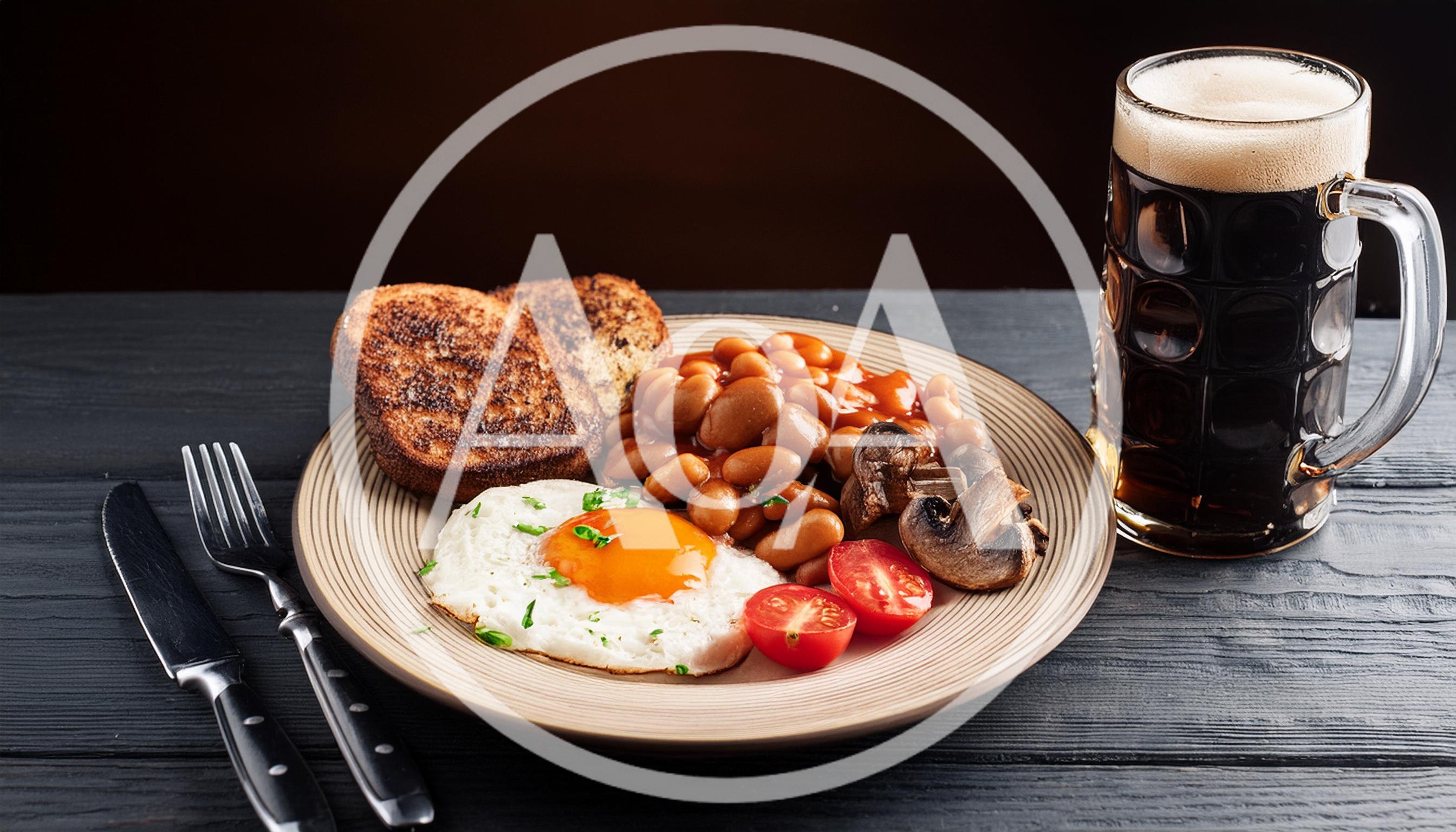 Traditional English Breakfast With Fried Egg And Beer