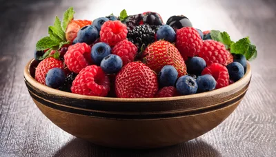 Fresh Mixed Berries In A Rustic Wooden Bowl